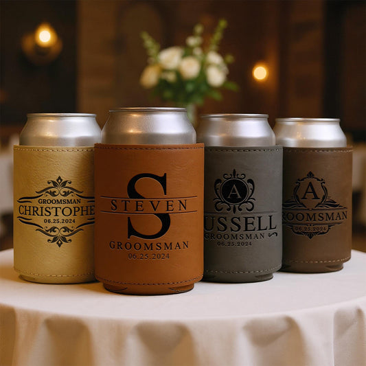 Personalized groomsman can coolers in brown and gray leather on a table, wedding gift idea