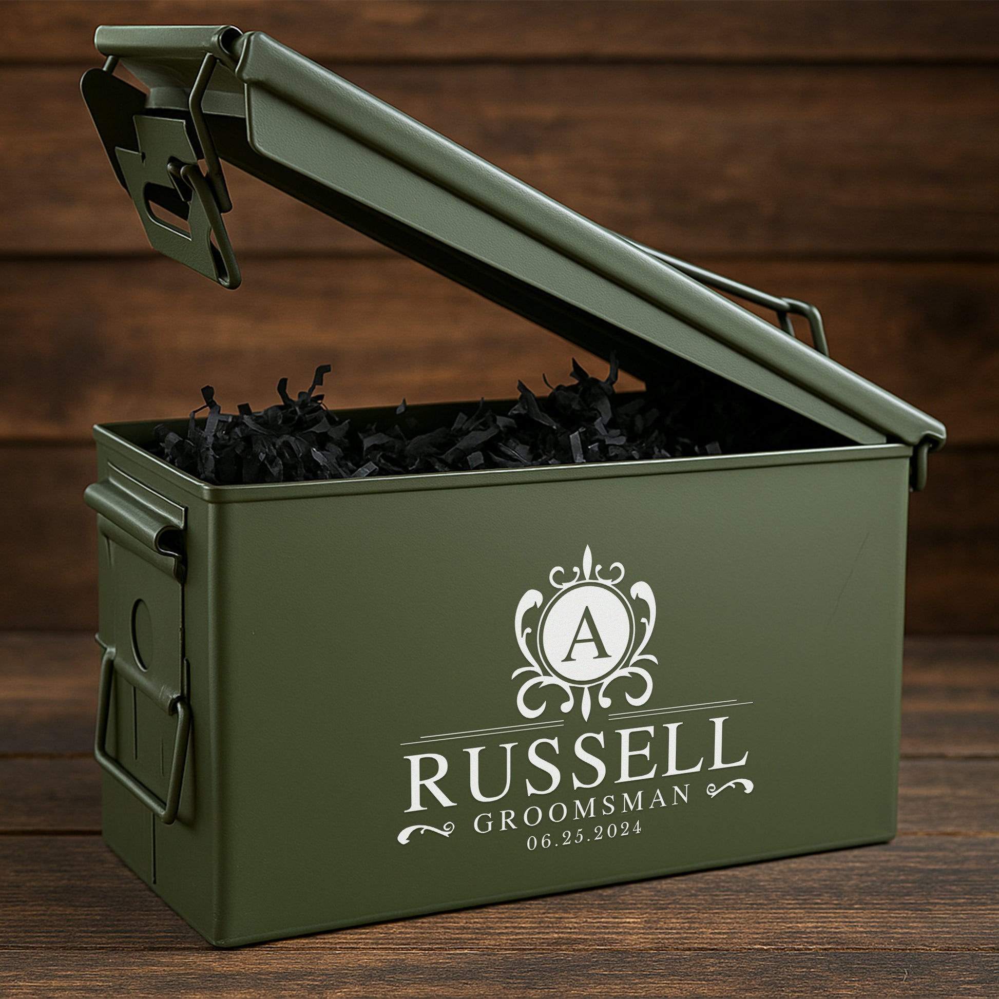 Personalized green metal gift box with groomsman name and date on rustic wooden background